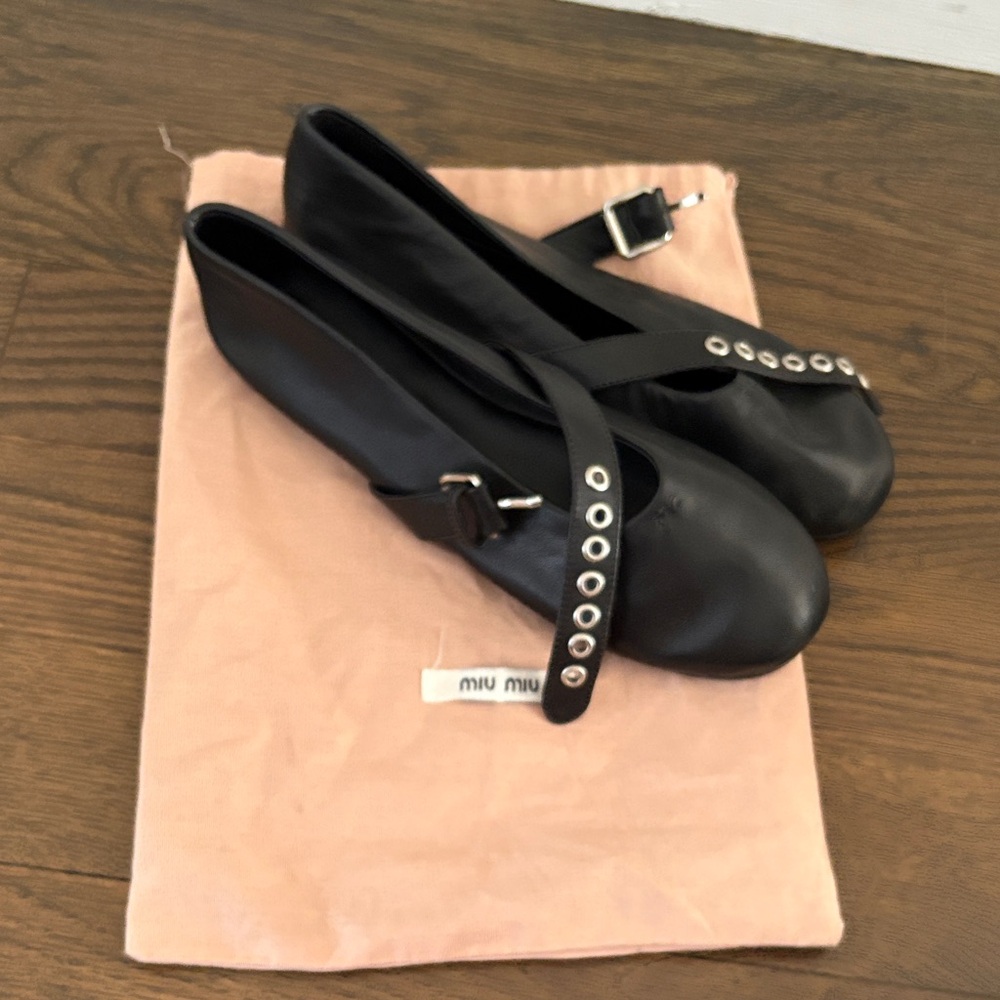 Miu Miu Black Leather Flats with Silver Accents